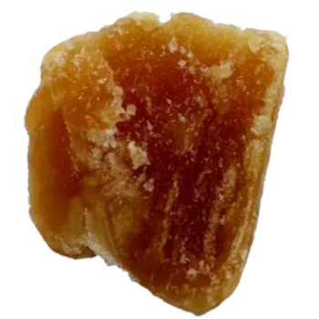 Extrait de CBD en crumble concentré à 91%, texture friable et couleur ambrée, idéal pour vaporisation ou infusion.